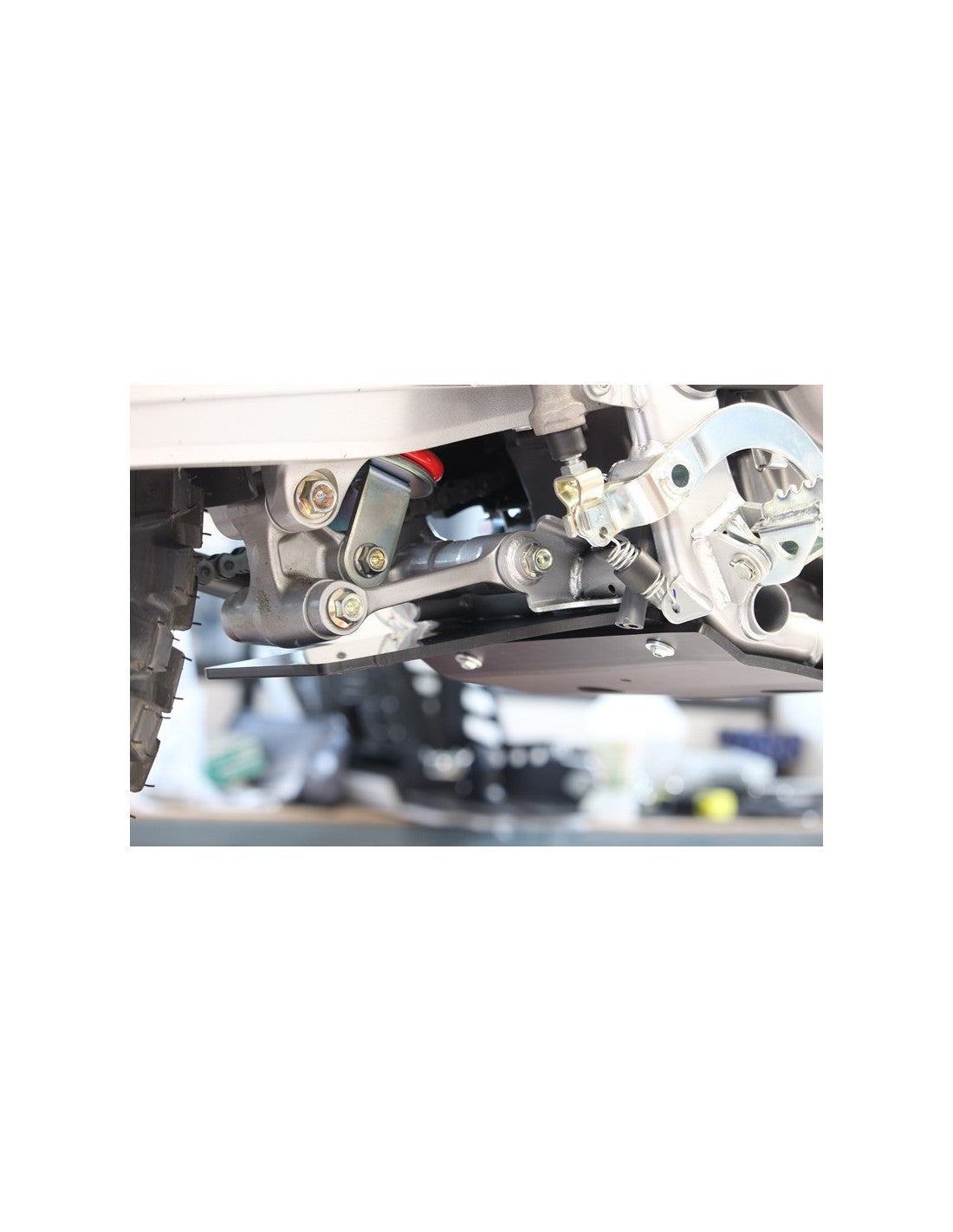 Close up view of the linkage guard for the Honda CRF300L