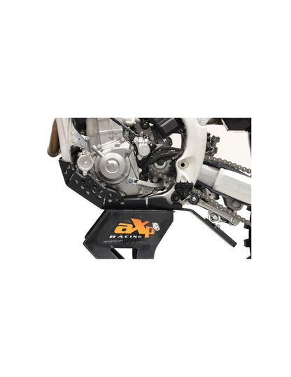 Left side of the black HDPE plastic skid plate with linkage guard for Honda CRF450R
