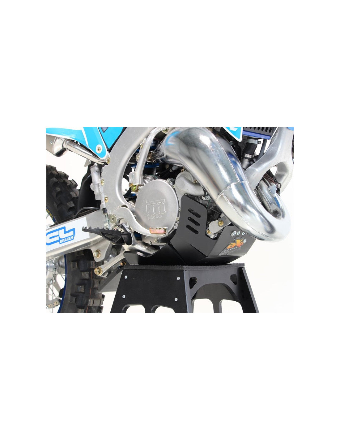 Left side of the black HDPE plastic skid plate with linkage guard for TM Racing EN125Fi and EN144Fi