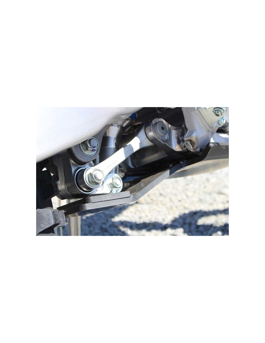 Close up view of the linkage guard of the black HDPE plastic skid plate for Yamaha WR250F - WR450F